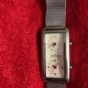 Skaagen dual time mother of pearl watch.